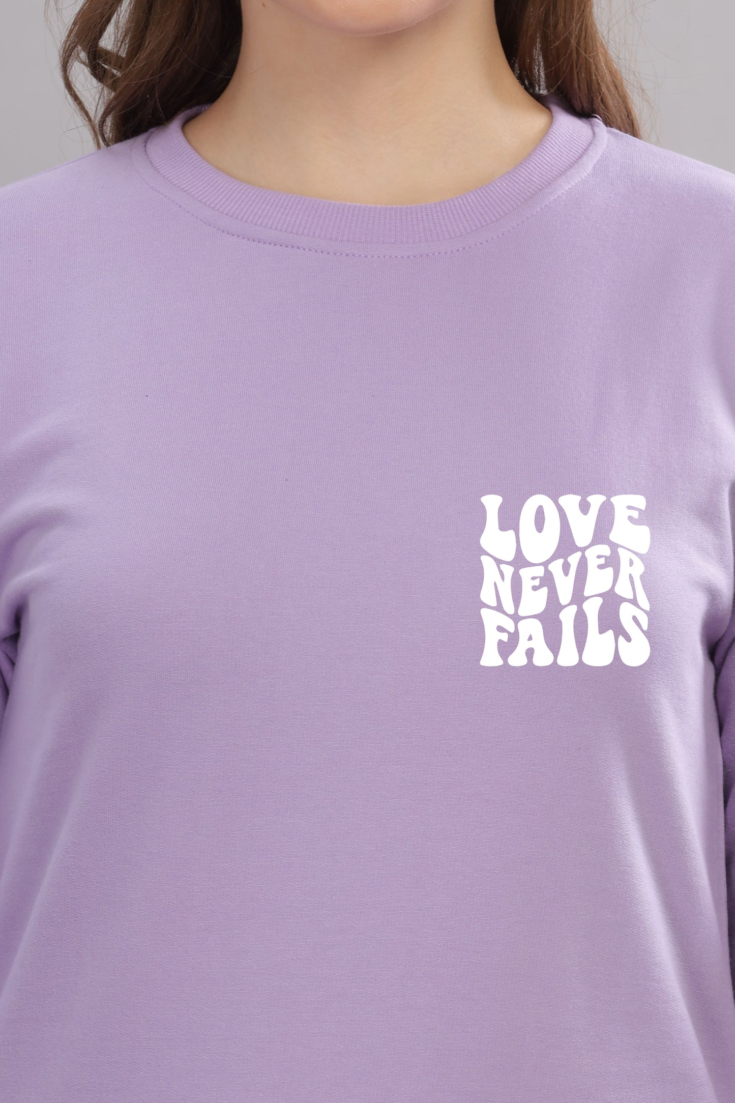 Love Never Fails Women’s Sweatshirt | Cozy & Stylish