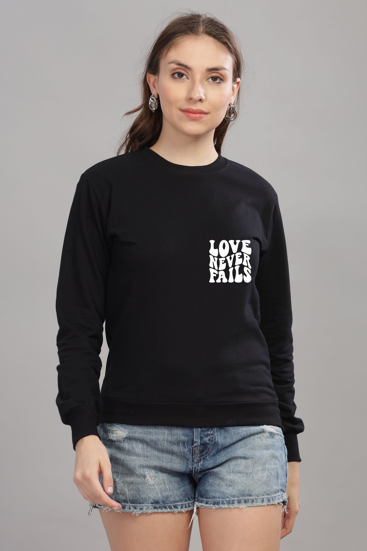 Love Never Fails Women’s Sweatshirt | Cozy & Stylish