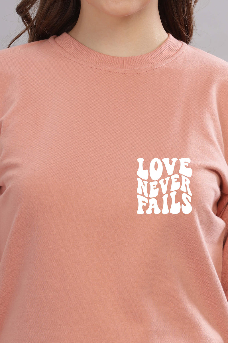 Love Never Fails Women’s Sweatshirt | Cozy & Stylish
