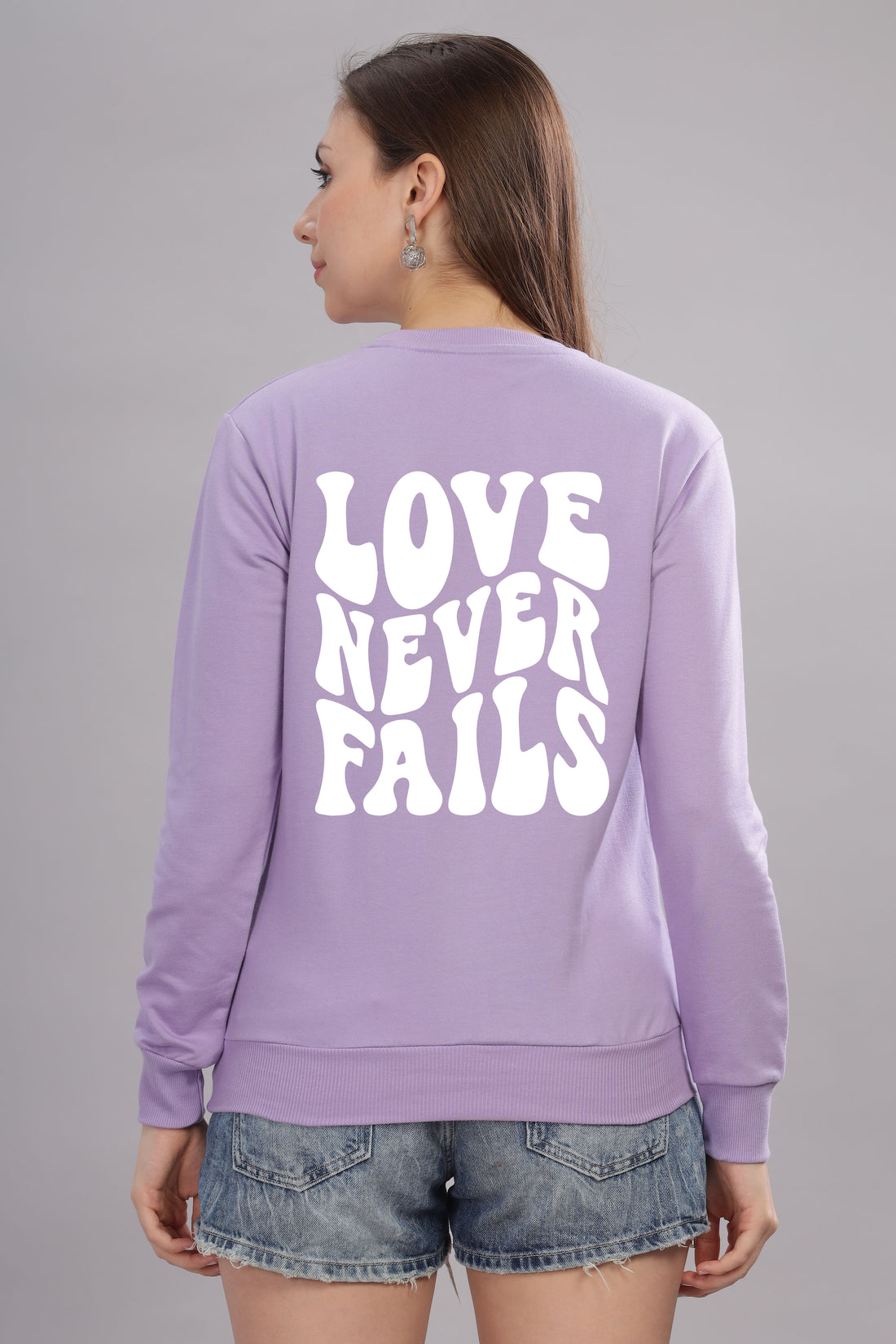 Love Never Fails Women’s Sweatshirt | Cozy & Stylish