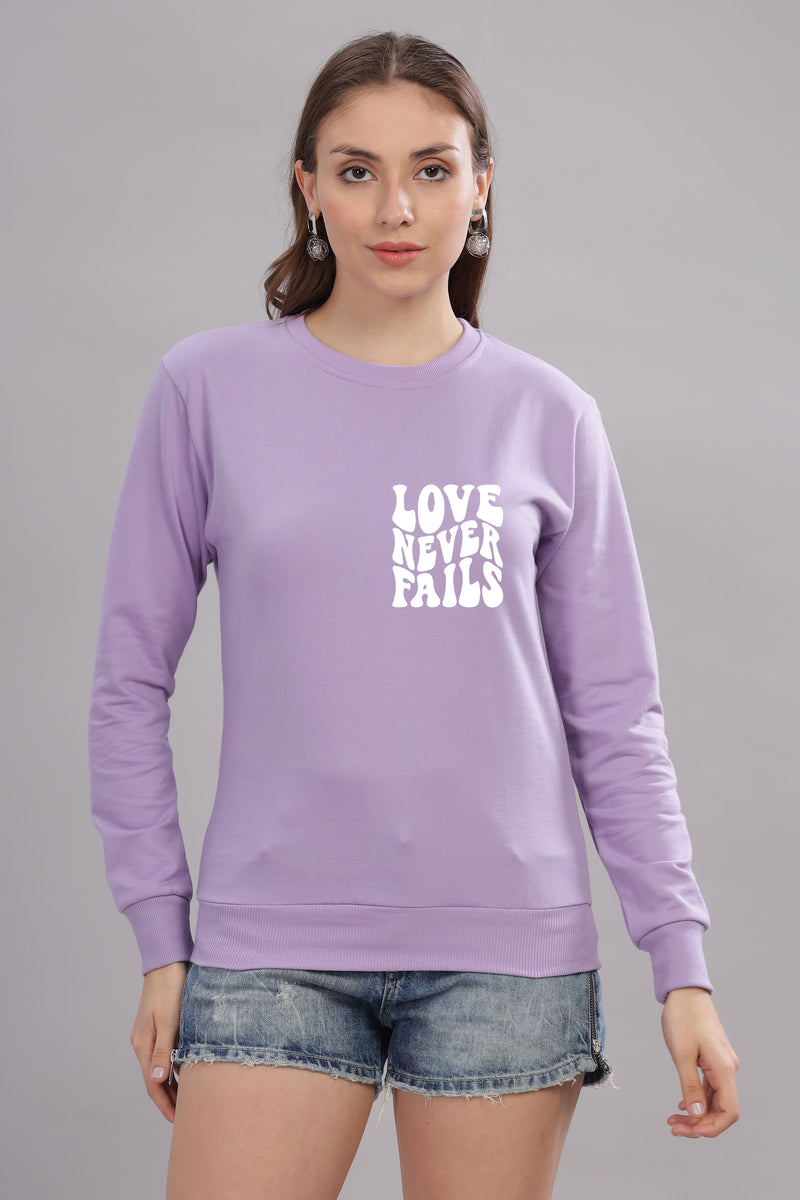 Love Never Fails Women’s Sweatshirt | Cozy & Stylish