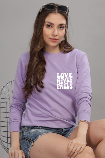 Love Never Fails Women’s Sweatshirt | Cozy & Stylish