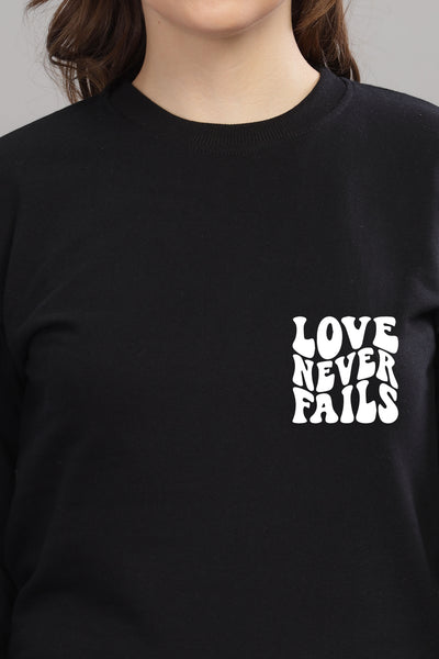 Love Never Fails Women’s Sweatshirt | Cozy & Stylish