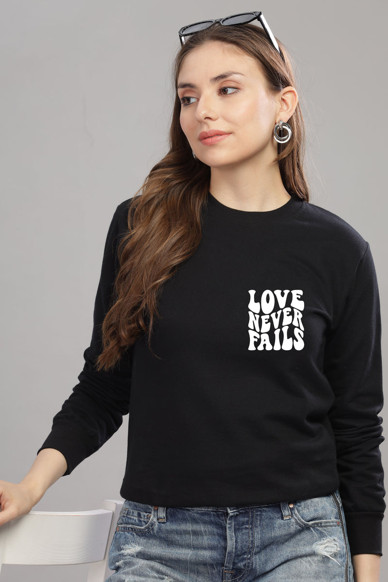Love Never Fails Women’s Sweatshirt | Cozy & Stylish